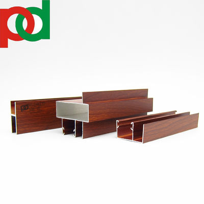 Çeşitli Boyut ve Tasarımlarda Ekstrüzyon Teknolojisi Kullanılarak Üretilmiş, Mat Siyah Ahşap Görünümlü Kapı Pencere Alüminyum Profilleri